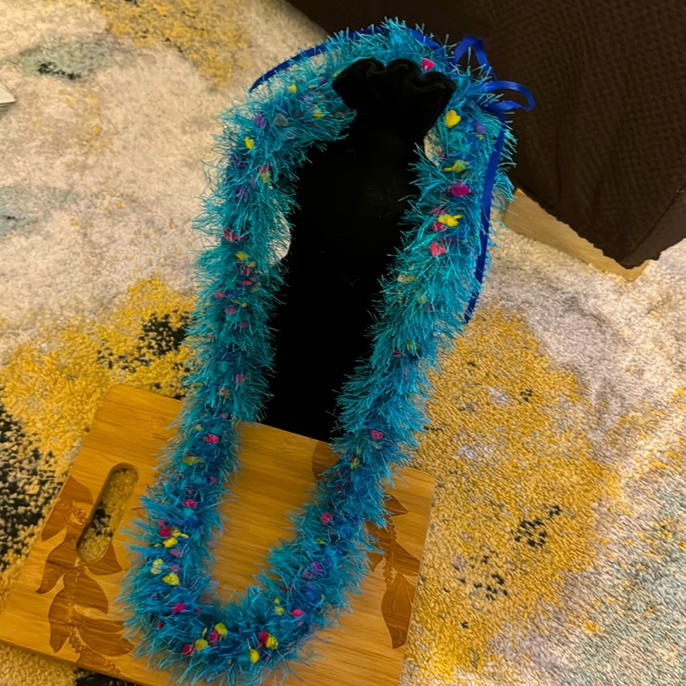 Hawaiian blue rainbow crochet yarn/eyelash yarn lei.